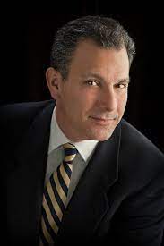 Professor. Joel Kahn